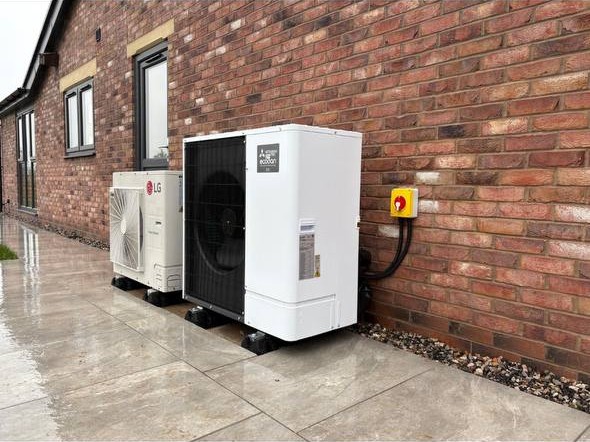 Outdoor air source heat pump system installed by Ecoheat in Lancashire