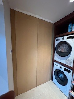 Indoor air source heat pump plant room installation with pipework