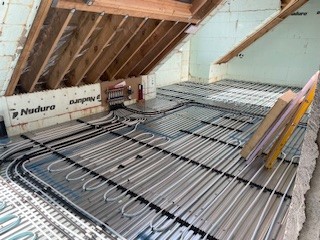 Underfloor heating pipework and installation by Ecoheat